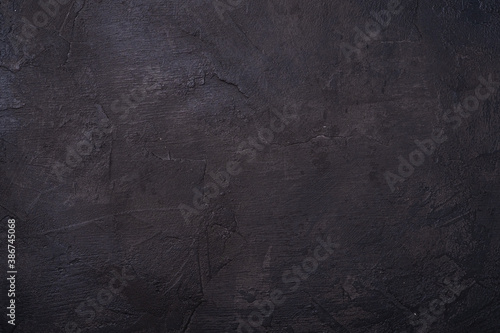 Cement dark black color textured background, stone concrete loft design wall