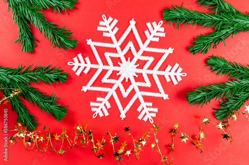 Christmas background with Christmas tree and white snowflake, spiral with Golden stars. 