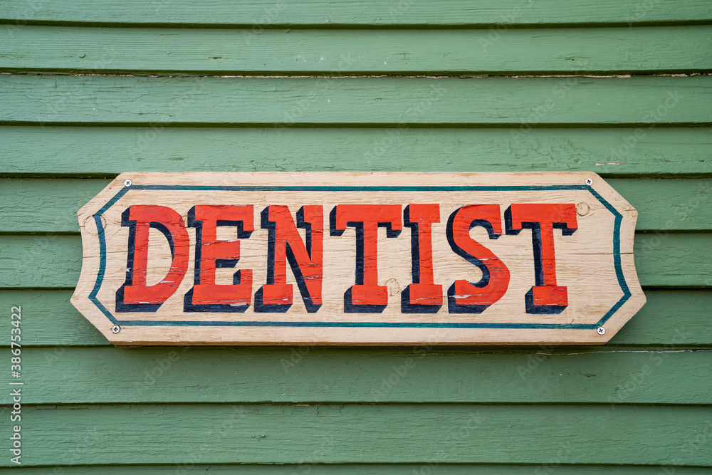 Old fashioned retro and vintage sign for a Dentist office