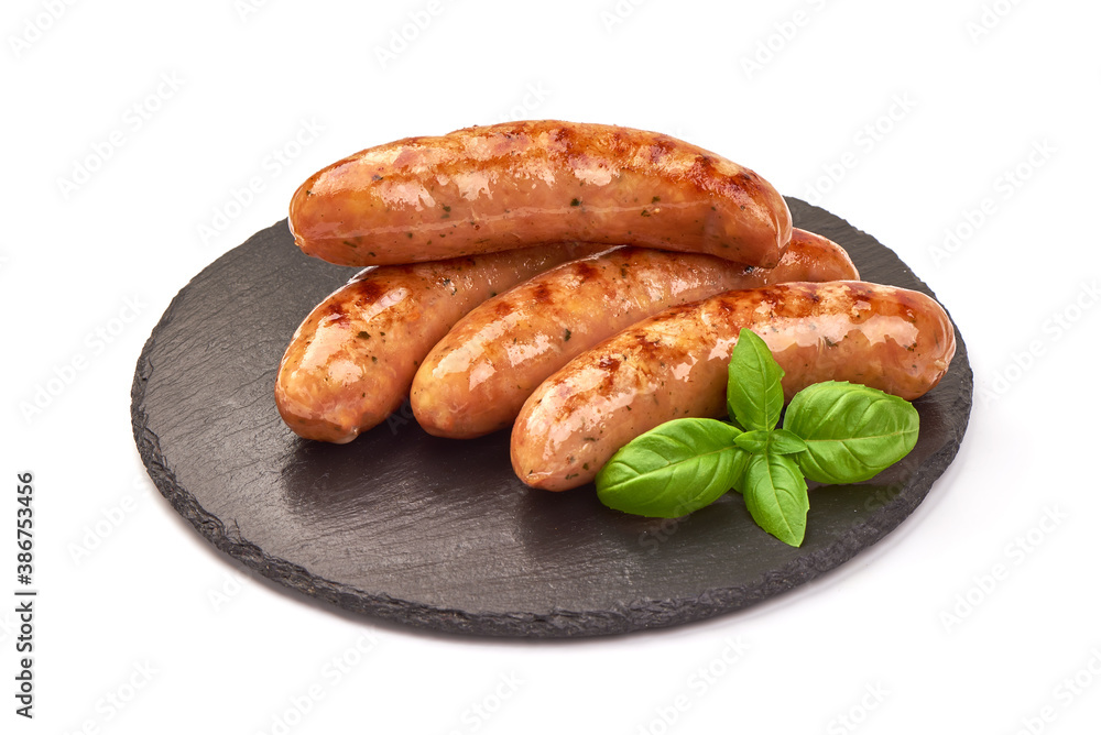 Grilled bavarian sausages, isolated on white background Grilled bavarian sausages, isolated on white background