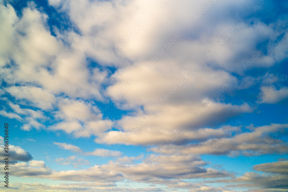 Beautiful textured sky with clouds at sunset Beautiful textured sky with clouds at sunset