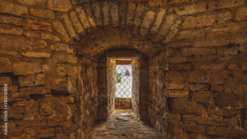 Interior of the old fortress tower. The window embrasures, thick walls.