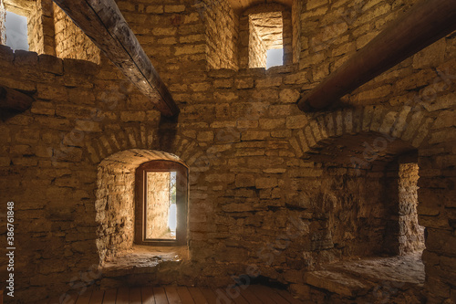 Interior of the old fortress tower. The window embrasures, thick walls.