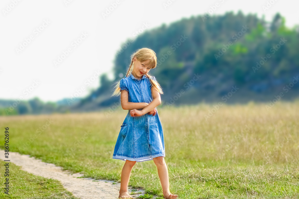 Happy child playing in nature in summer Happy child playing in nature in summer