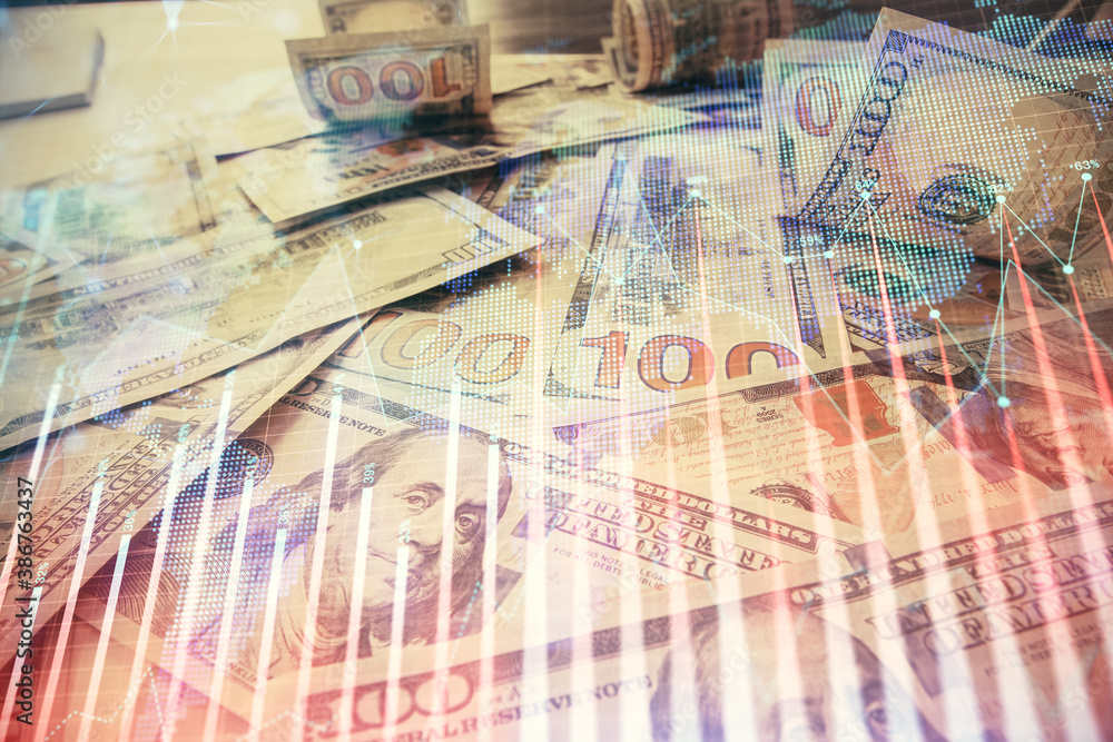 Multi exposure of forex chart drawing over us dollars bill background. Concept of financial success markets. Multi exposure of forex chart drawing over us dollars bill background. Concept of financial success markets.