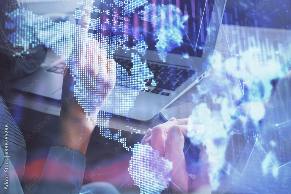 Double exposure of man and woman working together and forex chart hologram. Business concept. Computer background. Double exposure of man and woman working together and forex chart hologram. Business concept. Computer background.