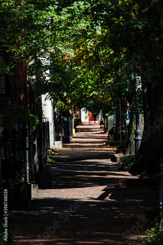 Boston, Massachusetts USA Pedestrians walking on Chestnut street in the Beacon Hill historic center of town.