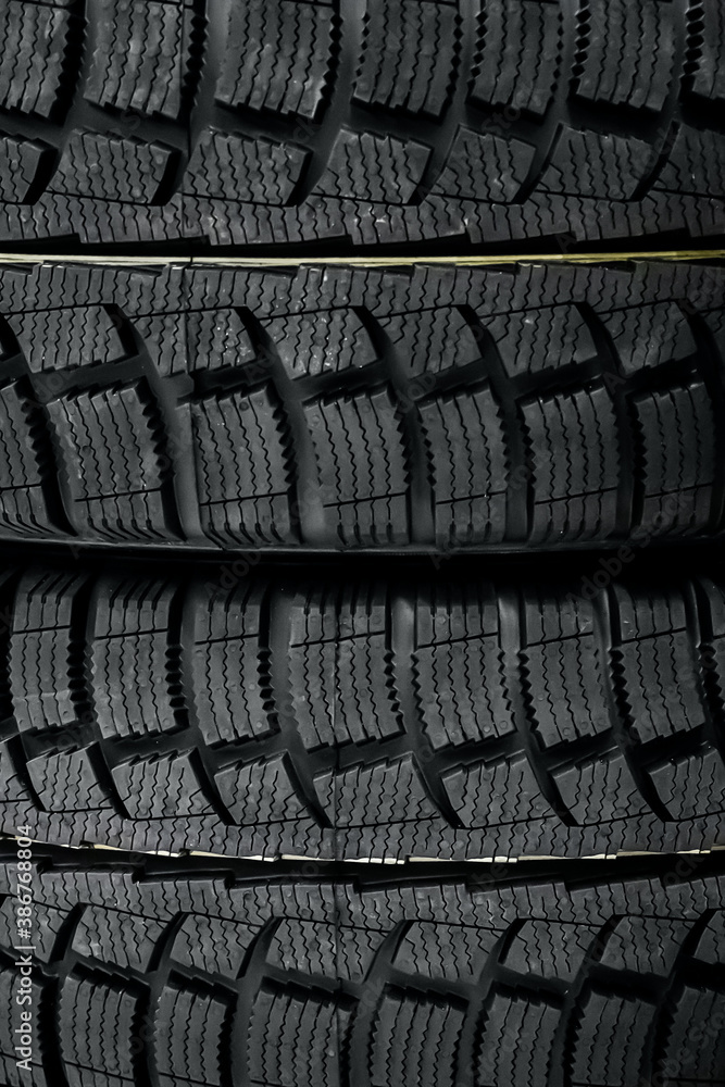 Fototapeta premium Texture of a car tire close up.