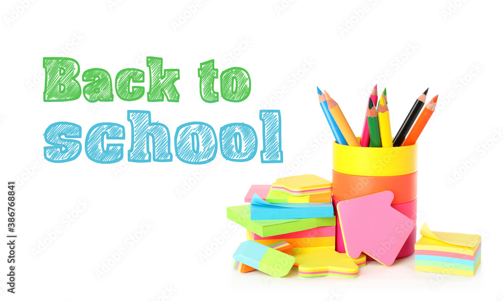 Fototapeta premium Text Back To School and different stationery on white background