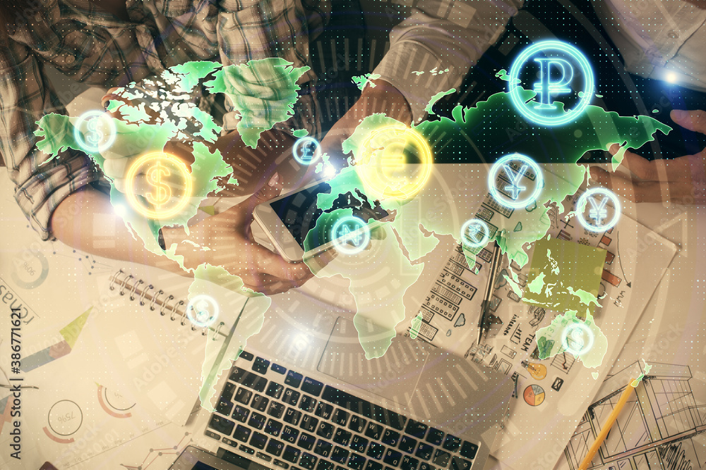 Double exposure of forex graph drawing and man and woman working together holding and using a mobile device. Trade concept. Double exposure of forex graph drawing and man and woman working together holding and using a mobile device. Trade concept.