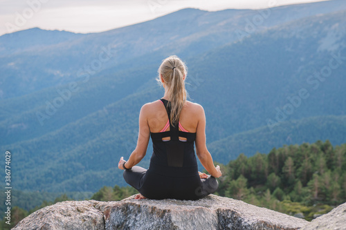 woman meditating yoga mountain postures