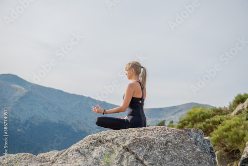 woman meditating yoga mountain postures