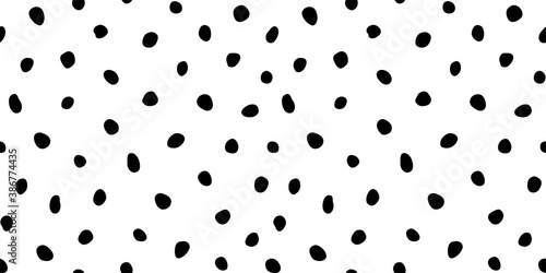 Hipster black and white seamless polka dot pattern. Vector irregular abstract texture with random hand drawn spots.