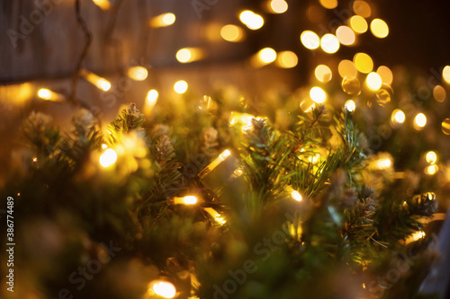 Christmas and New year decoration, defocused garland lights.