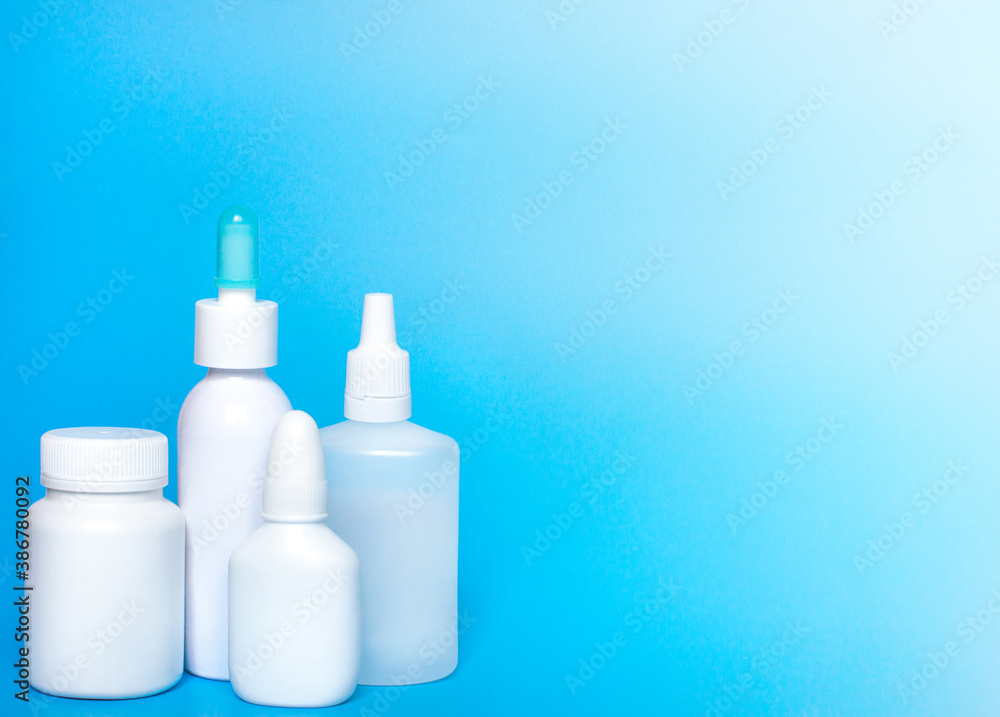 Bottle mockup on blue background. Bottle, container from pills, capsules. Bottle mockup on blue background. Bottle, container from pills, capsules.