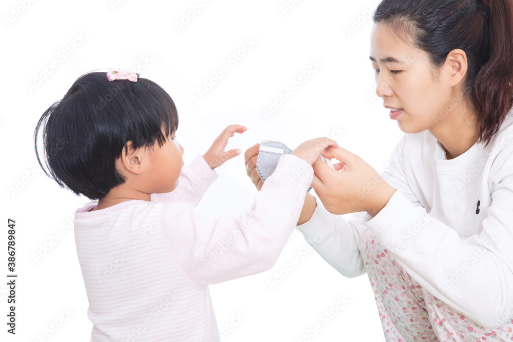 Daughter and mother are analyzing how to wear masks Daughter and mother are analyzing how to wear masks