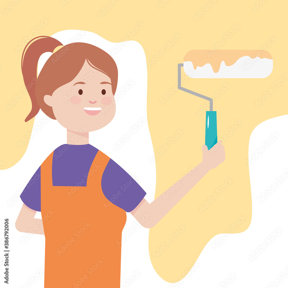 girl painting yellow wall with paint roller remodeling girl painting yellow wall with paint roller remodeling