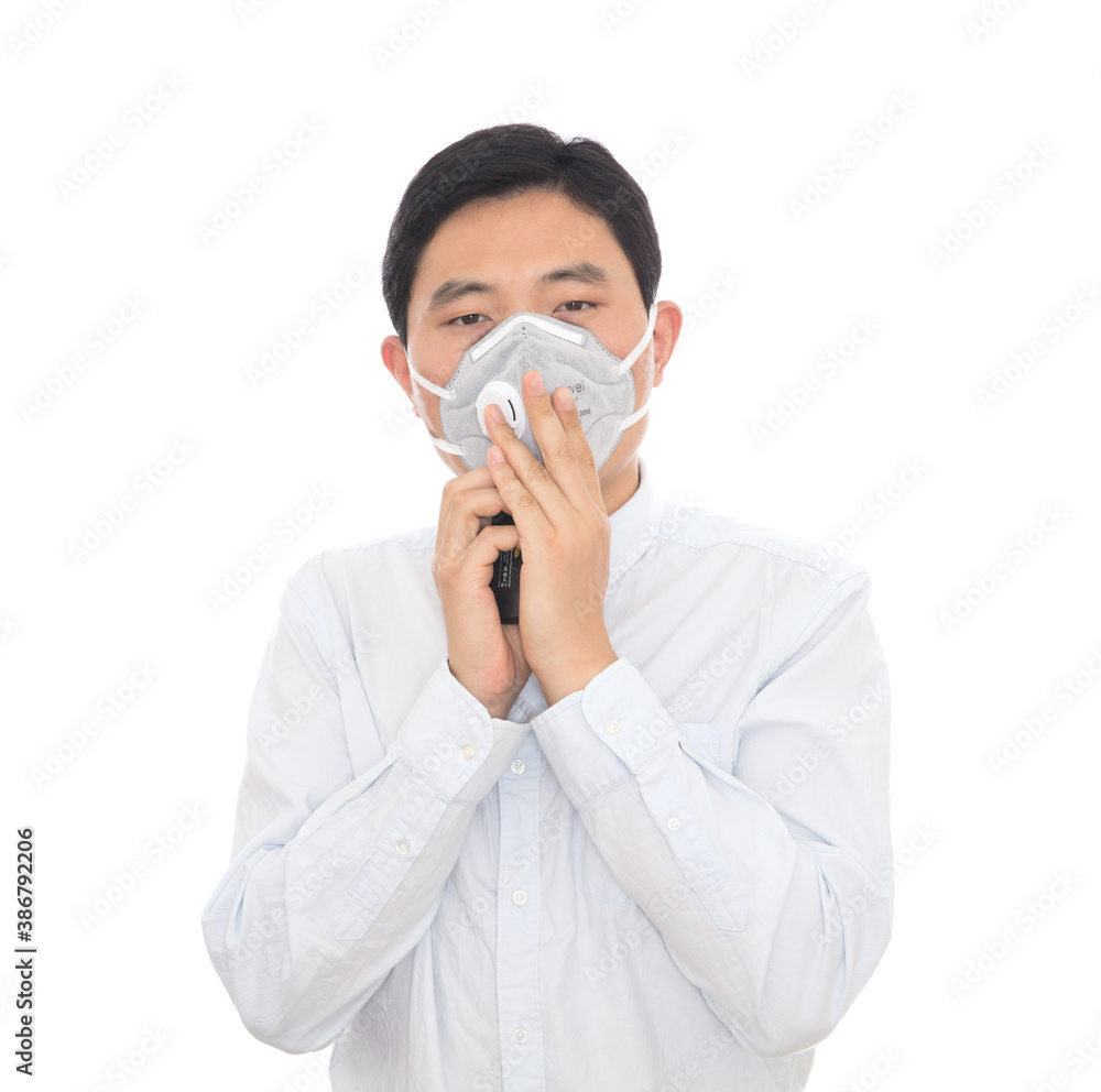 Man wearing a mask in front of a white background