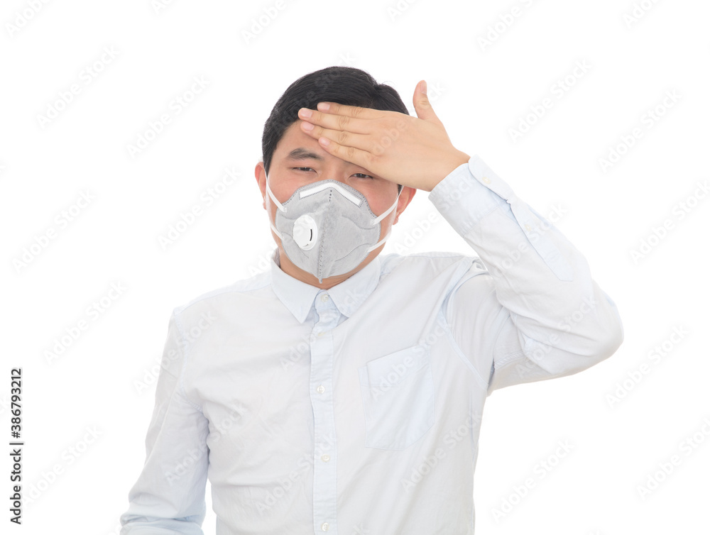 A man wearing a mask touched his forehead and suspected a fever A man wearing a mask touched his forehead and suspected a fever