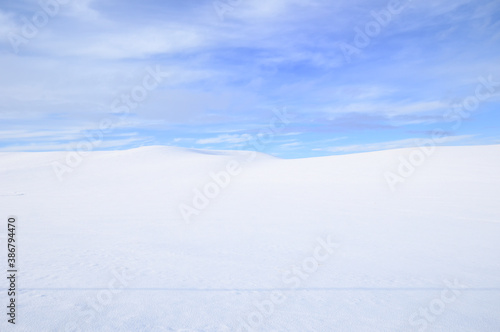Cold Cirrus Clouds in an otherwise Blue Sky over a Snow Covered Countryside in the Palouse of Eastern Washington State, USA  © David Williamson