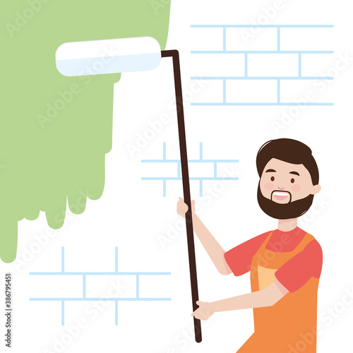 man painting green wall with paint roller with long stick remodeling