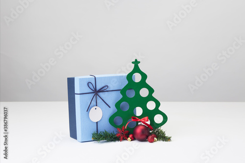 Decorated Christmas balls and Christmas tree with gift box