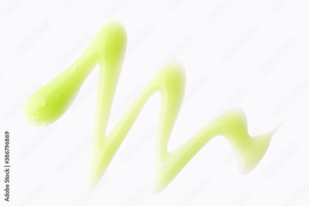 Green color cosmetic gel in abstract shape on background Green color cosmetic gel in abstract shape on background