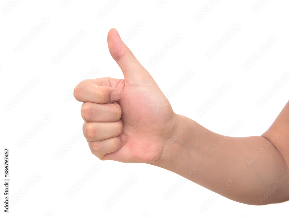 Thumbs up hand in front of white background Thumbs up hand in front of white background