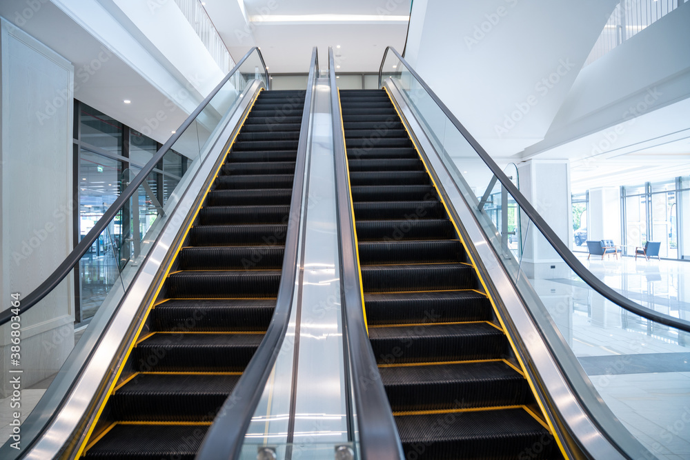 Modern luxury electric escalators with staircase . Modern luxury electric escalators with staircase .