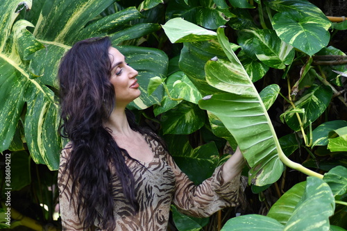 Beauty portrait of a beautiful young woman with evening sun as backlight.