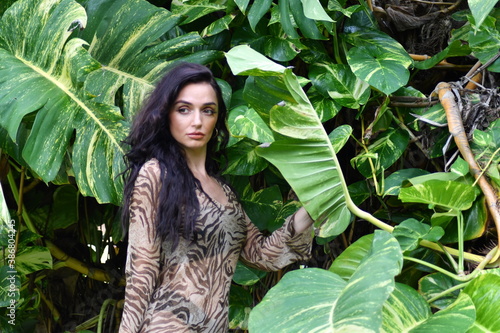 Portrait of beautiful woman in rainforest
