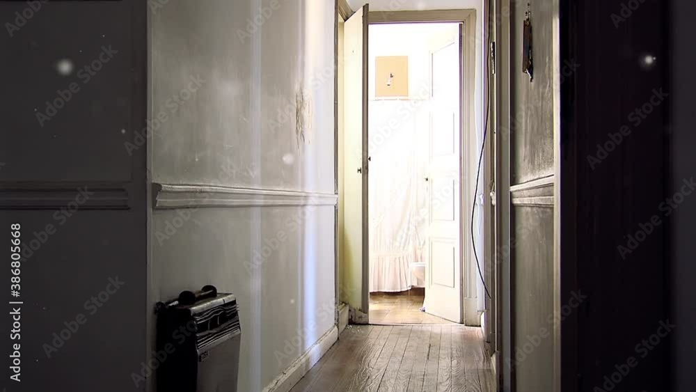 Corridor and Open Bathroom Door in an Old Empty Apartment. Zoom Out. Corridor and Open Bathroom Door in an Old Empty Apartment. Zoom Out.