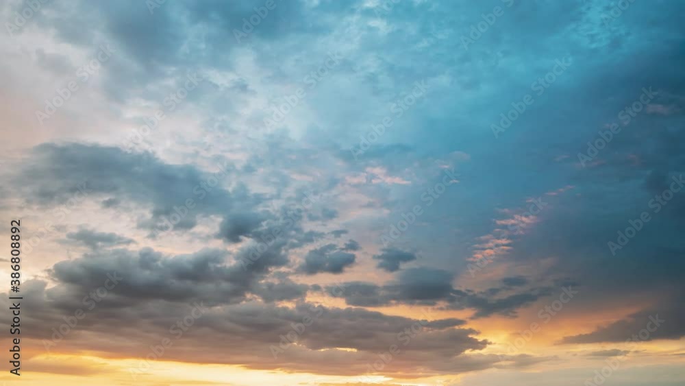Spring Meadow At Evening Sunset. Natural Bright Dramatic Sky Pink Colours Above Countryside Meadow Landscape. Agricultural Landscape In May. Time Lapse Time-lapse Timelapse