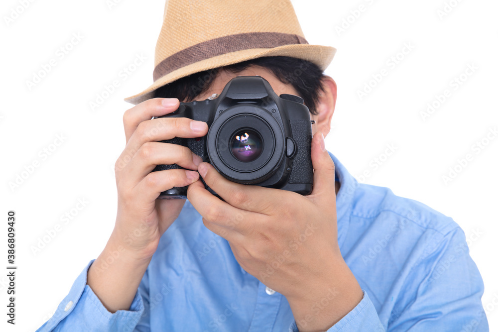 Stylishly dressed male photographer taking pictures Stylishly dressed male photographer taking pictures
