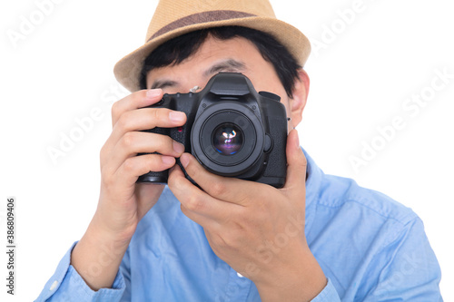 Stylishly dressed male photographer taking pictures