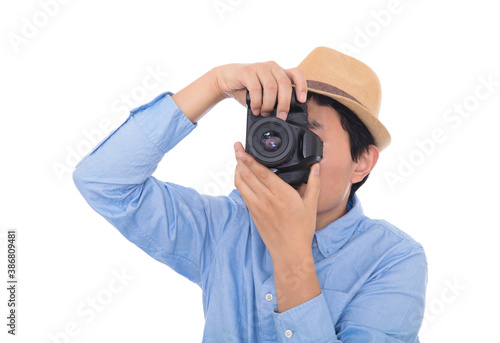 Stylishly dressed male photographer taking pictures