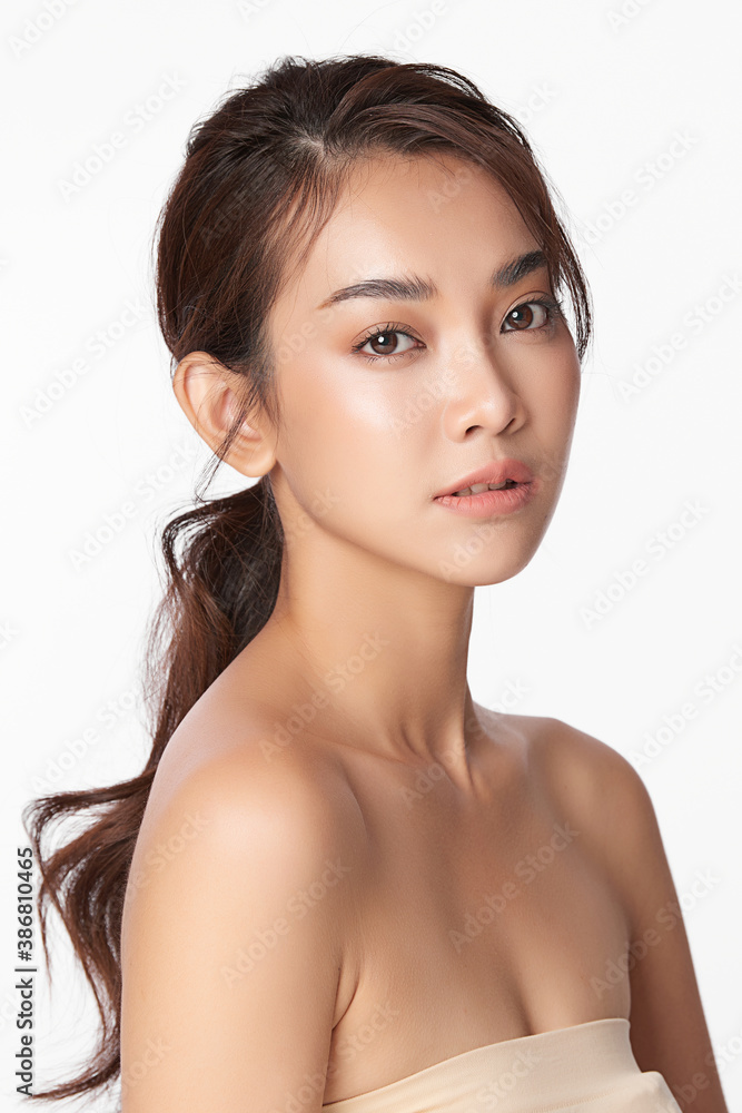 Beautiful young asian woman with clean fresh skin on white background, Face care, Facial treatment, Cosmetology, beauty and spa, Asian women portrait Beautiful young asian woman with clean fresh skin on white background, Face care, Facial treatment, Cosmetology, beauty and spa, Asian women portrait