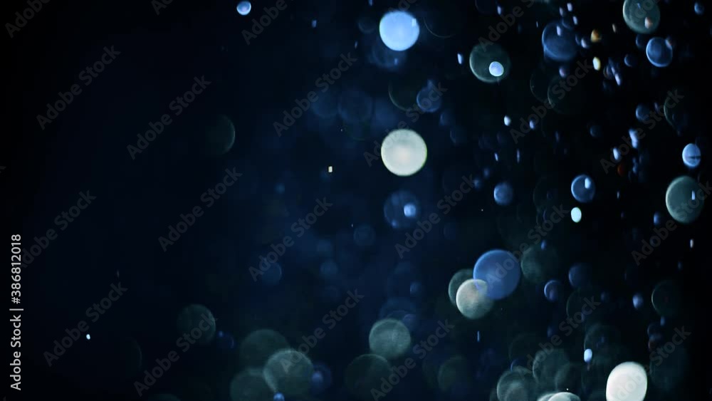 Golden Glitter Sparkling Magic light. Shining gold Dust particles Trail Crossing sparkles on black background 4K. Birthday, Anniversary, new year, event, Christmas, Festival, Diwali. Golden Glitter Sparkling Magic light. Shining gold Dust particles Trail Crossing sparkles on black background 4K. Birthday, Anniversary, new year, event, Christmas, Festival, Diwali.