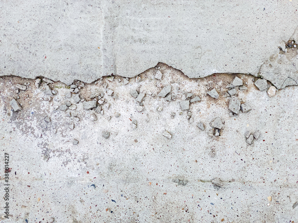 Obraz premium rough crack cement texture. gray concrete floor background