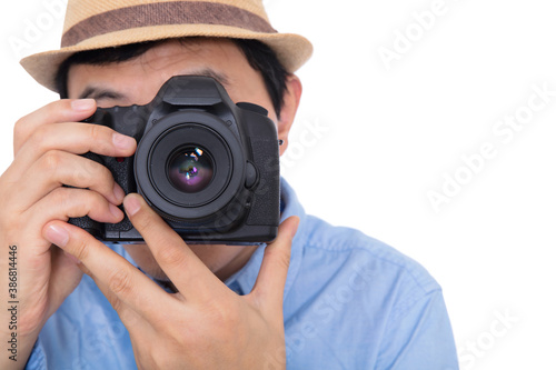 Photographer using SLR camera to take pictures