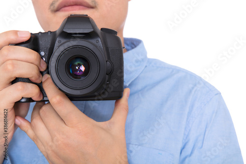 Male photographer shooting with SLR camera