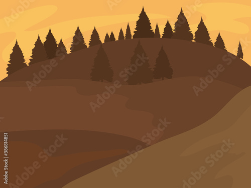 mountain landscape with forest under evening sky with orange rising