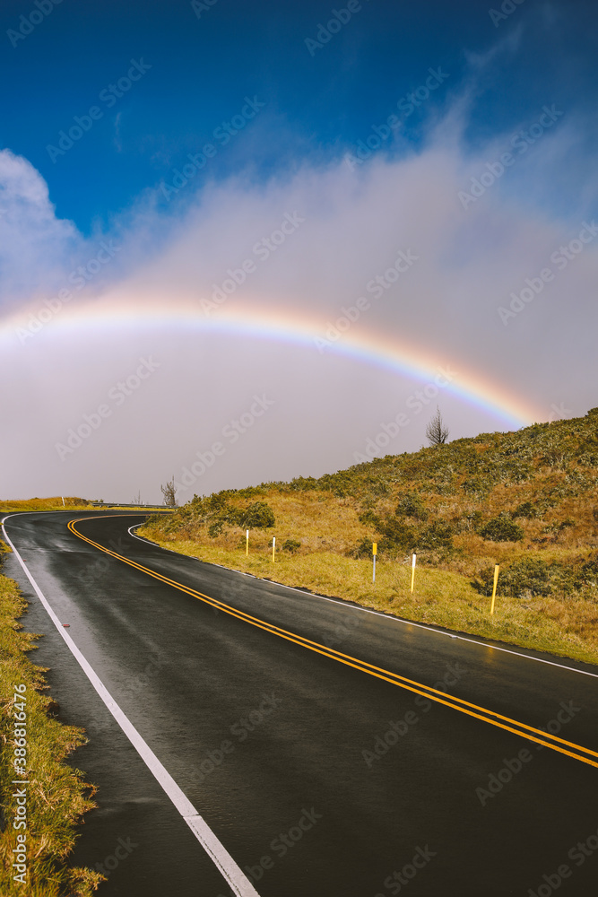 Rainbow over the road, Haleakala Highway, Maui, Hawaii