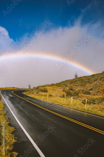 Rainbow over the road, Haleakala Highway, Maui, Hawaii © youli