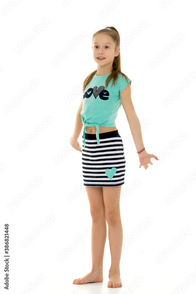 The little girl spread her arms to the sides, children's emotions. The little girl spread her arms to the sides, children's emotions.