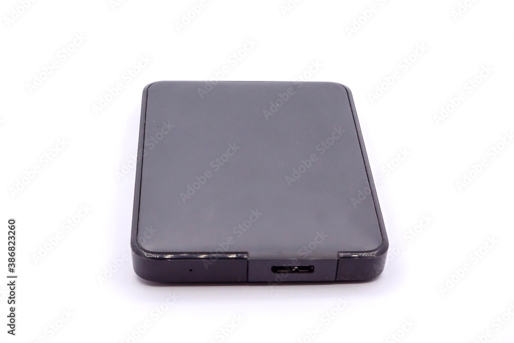 HDD - Grey Portable External Hard Disk Drive isolated on white background. External hard disk drives. HDD - Grey Portable External Hard Disk Drive isolated on white background. External hard disk drives.
