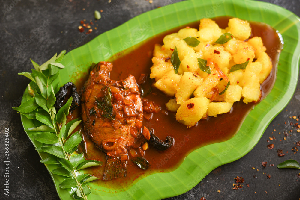 Top view tapioca with spicy hot Kerala fish curry Indian food. pearl