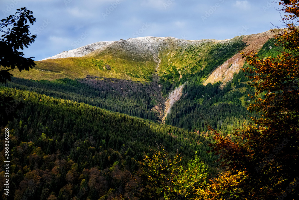 First signs of winter on the mountains peaks of the Carpathians in Romania