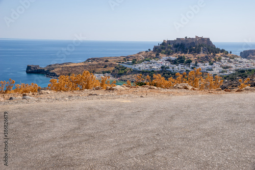 viewpoint in the parking bay overlooking the town of Lindos in Rhodes
