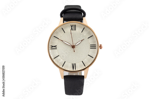 Classic fashion gold wristwatch with black leather strap and roman numerals on white dial face, isolated on white background.